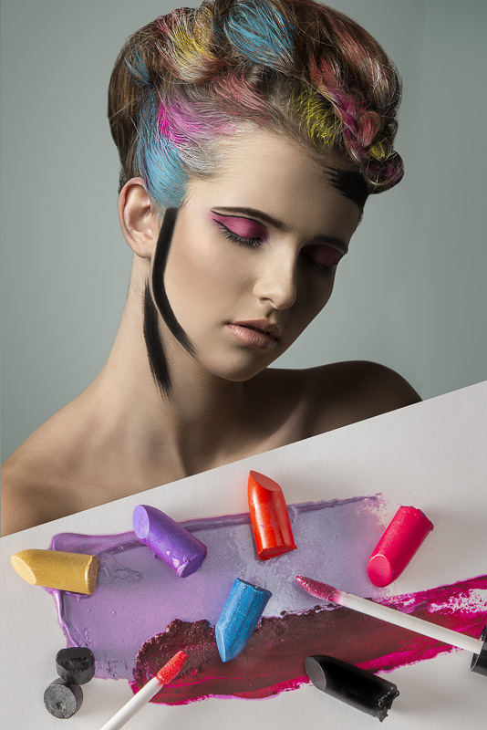 gorgeous colorful beauty portrait of young girl with multicolor painted hair-style and cute make-up